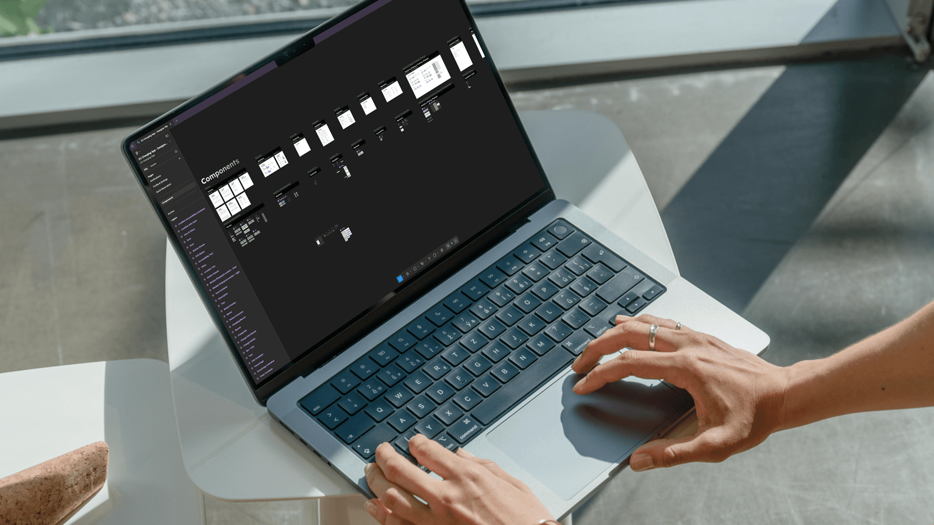 Figma system file containing charging screens, components, and documented usage states.